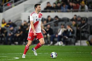 Revs defender Dave Romney