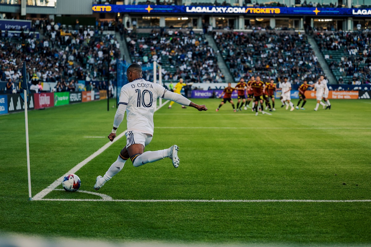 LA Galaxy Right Winger Douglas Costa takes a corner kick in the Galaxy's 2-1 loss against the Seattle Sounders on April 1, 2023. (Photo Credit: LA Galaxy)