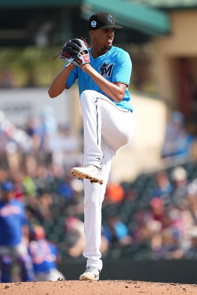 Eury Pérez #76 of the Miami Marlins prepares to deliver a pitch in the game against the New York Mets at Roger Dean Stadium on March 4, 2023 in Jupiter, Florida.