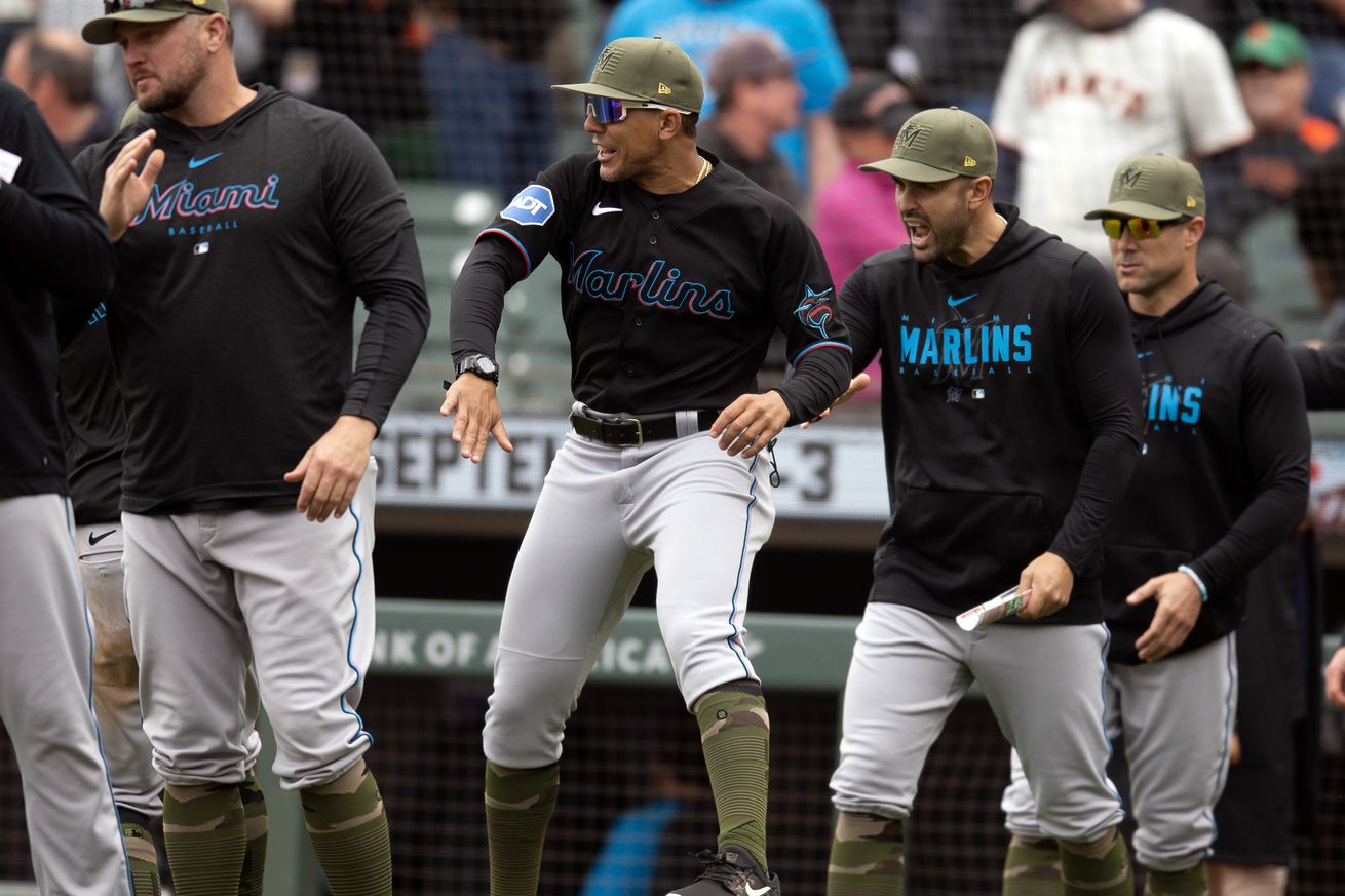 San Francisco, California, USA; Miami Marlins players celebrate their 1-0 victory over the San Francisco Giants at Oracle Park