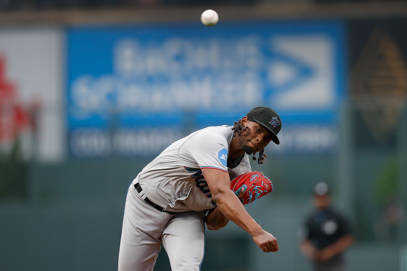 Miami Marlins starting pitcher Edward Cabrera (27) pitches in the first inning against the Colorado Rockies at Coors Field.